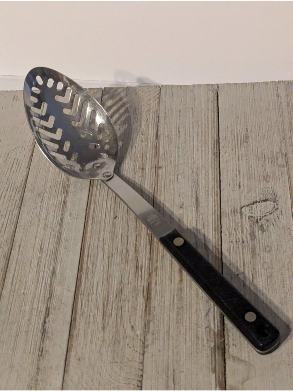 Ekco Flint Stainless Vanadium Slotted Serving Spoon 11 1/4" Black Handle
